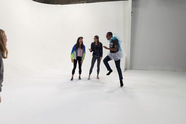 Youth Corps students choreographing their commercial production.