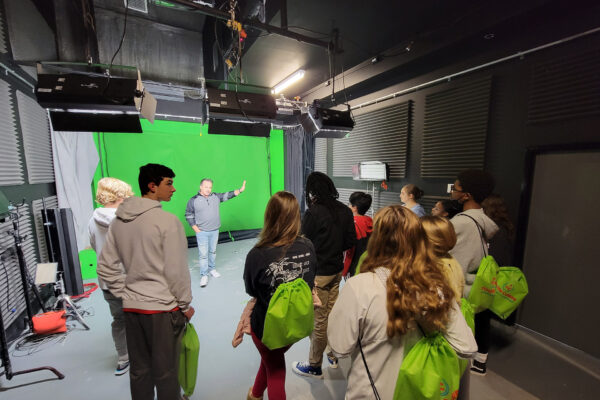 Youth Corps students learn about green screen visual effects.