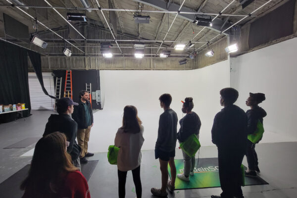 Youth Corps students tour Genesis Studios.
